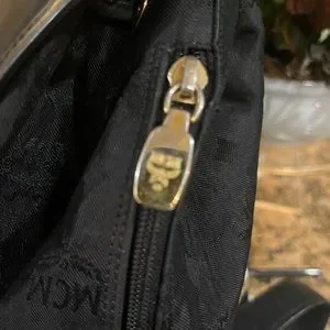MCM | Bags | Mcm Leather Trim And Nylon Backpack Euc | Poshmark